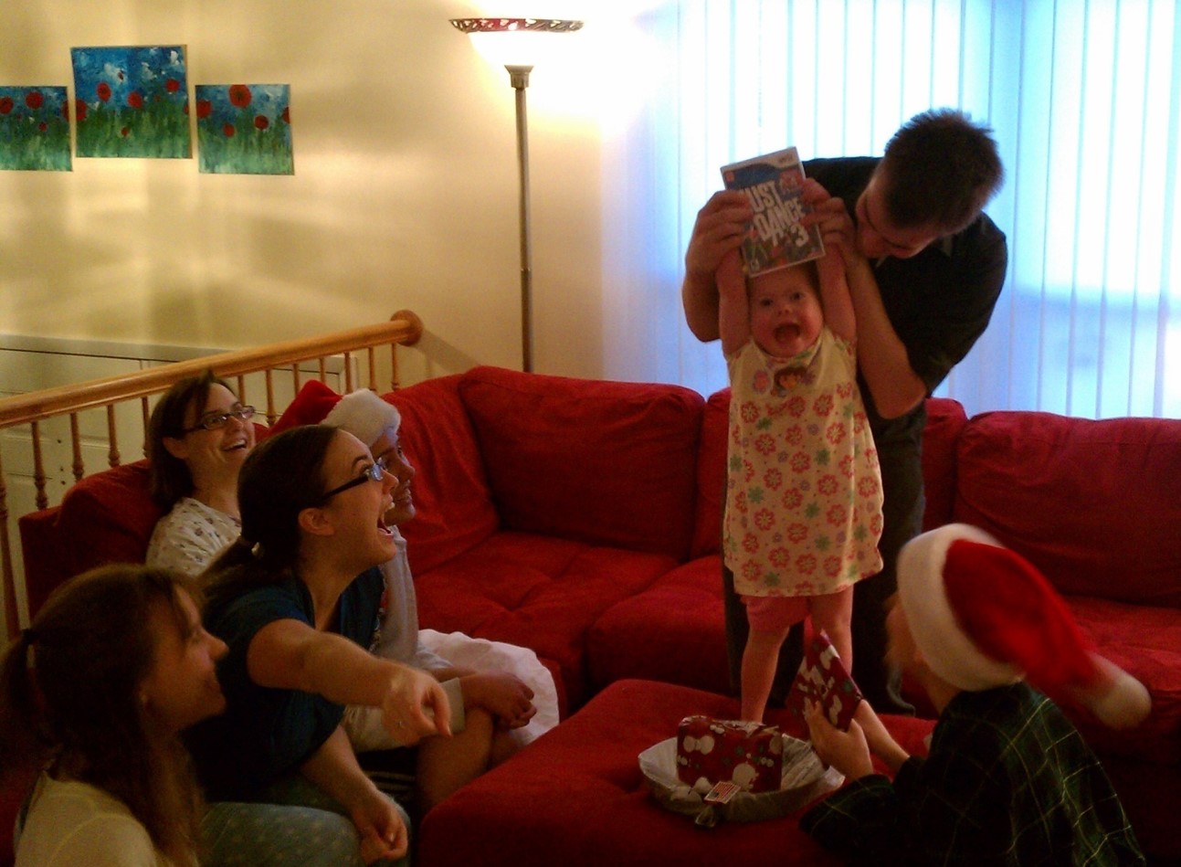 My daughter, Christmas morning 2011, with Mom and most of her siblings. © KJB, 2011